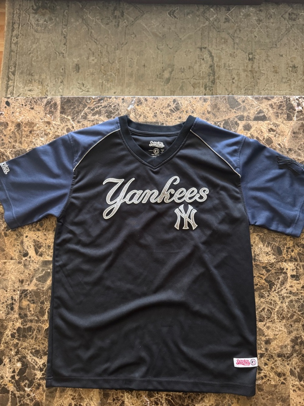 Stitches Black V‑Neck Athletic Jersey with White Logo